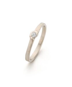 Champagne gold natural engagement ring with all-round matte finish and subtle diamond enclosed by polished detail.