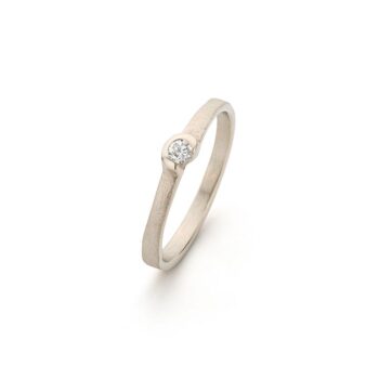 Champagne gold natural engagement ring with all-round matte finish and subtle diamond enclosed by polished detail.