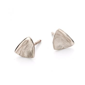 Subtle natural gold earrings in the shape of a triangle with a rough, matte finish and polished details.