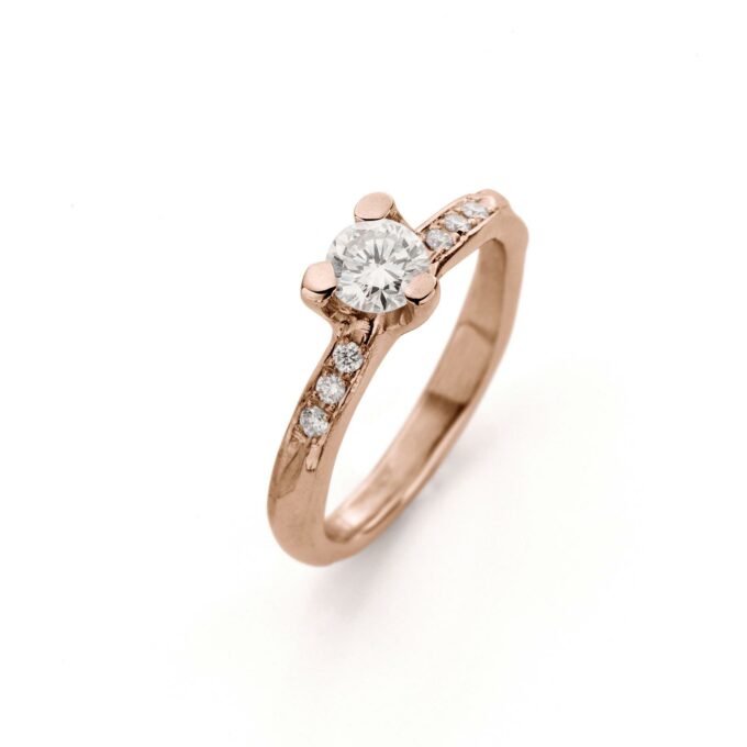 Rose gold engagement ring with diamonds