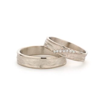 Stylish champagne gold wedding rings with matte finish and polished edges.